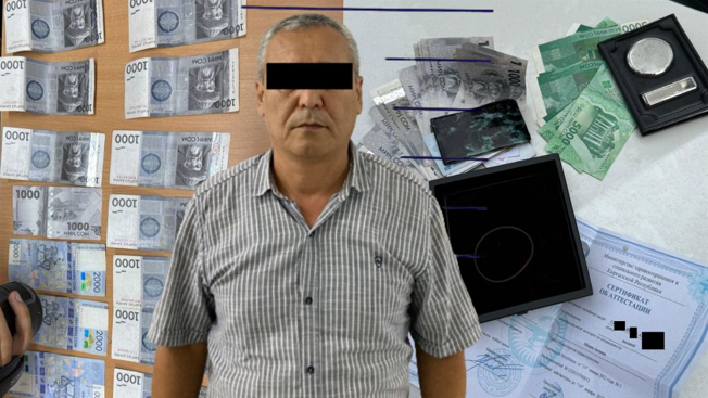 Бишкекте жарандардан акча опузалаган дарыгер кармалды