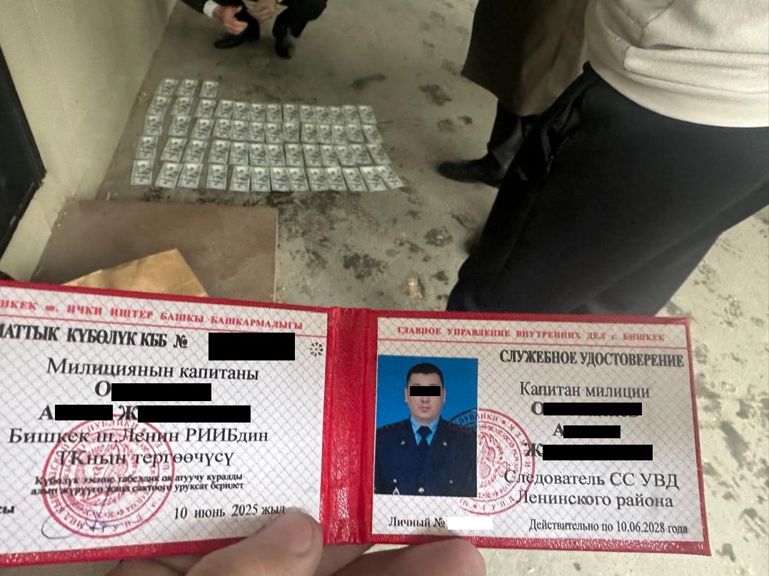 25 миң доллар пара талап кылган милиция кызматкери кармалды